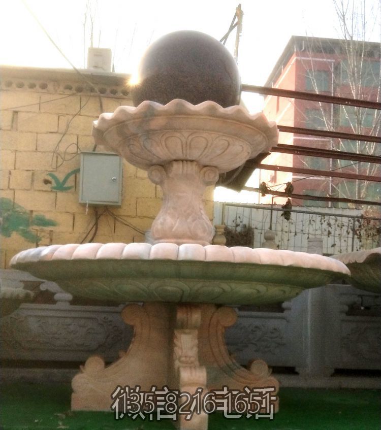 晚霞紅石雕風(fēng)水球噴泉