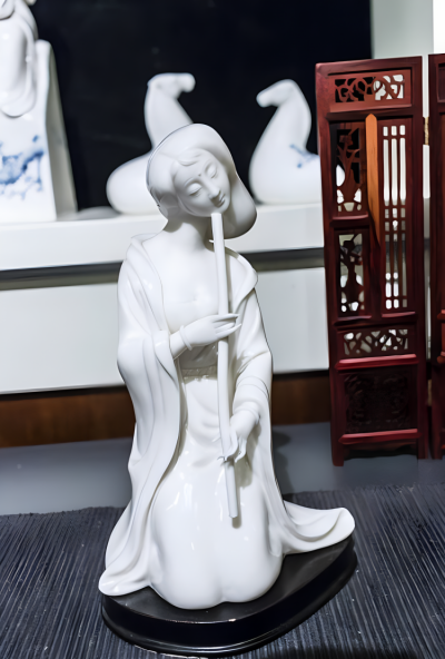 漢白玉吹簫的古代美女石雕